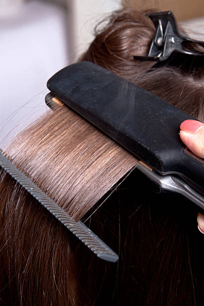 istock Beautiful Young Hairdresser 493341368