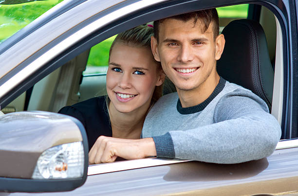 istock young couple in car 493341410