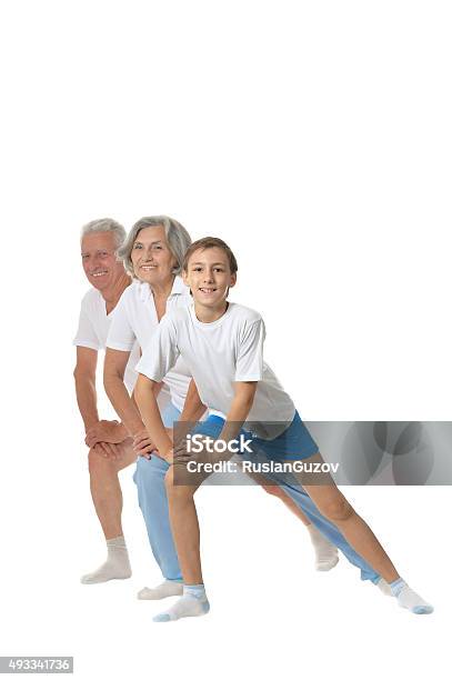 Grandparents With Boy Stock Photo - Download Image Now - 2015, Adult, Beautiful People