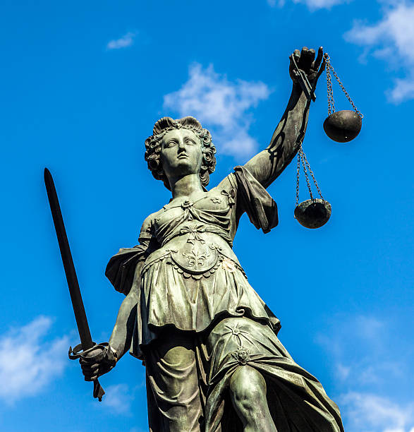 istock Justitia, a monument in Frankfurt, Germany 493371957