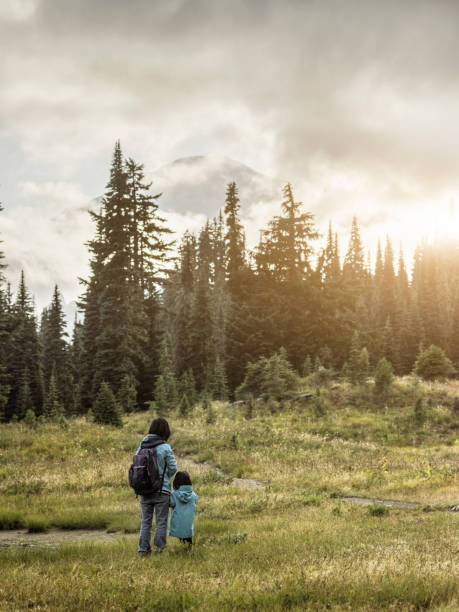 istock mother hiking with daughter at MT.Rainier 493375558