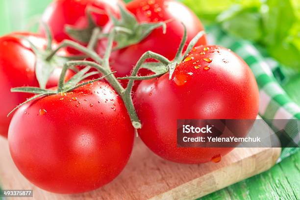 Tomatoes Stock Photo - Download Image Now - Agriculture, Basil, Bright