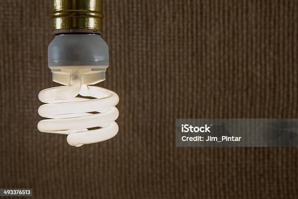 White Cfl Light Bulb Closeup Stock Photo - Download Image Now - Bright, Brown, Burlap
