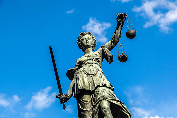 istock Justitia, a monument in Frankfurt, Germany 493376847