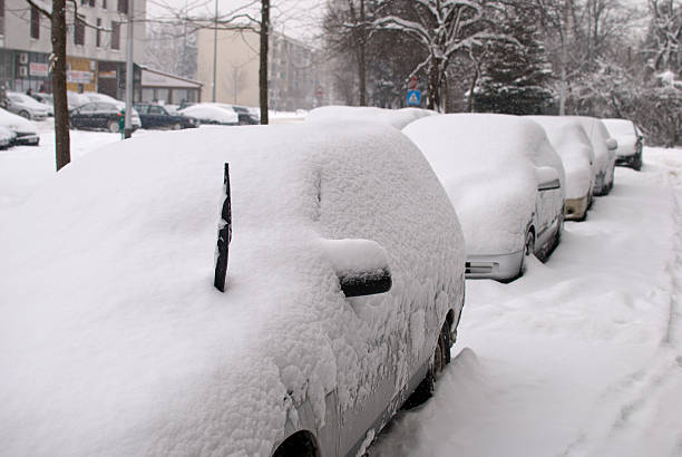 istock Cars covered with snow 493378165