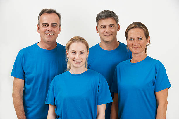 istock Studio Portrait Of Staff Wearing Uniform Against White Backgroun 493379632