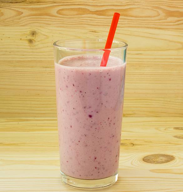 istock Smoothie with strawberry and red straw 493386648