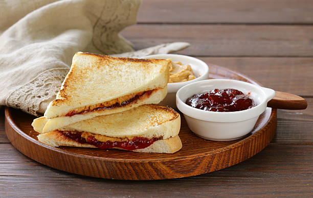 istock sandwiches with peanut butter and strawberry jam 493433036