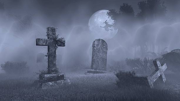istock Big full moon above old spooky cemetery 493436724