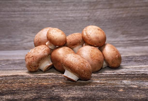 istock Bunch of brown champignons 493437780