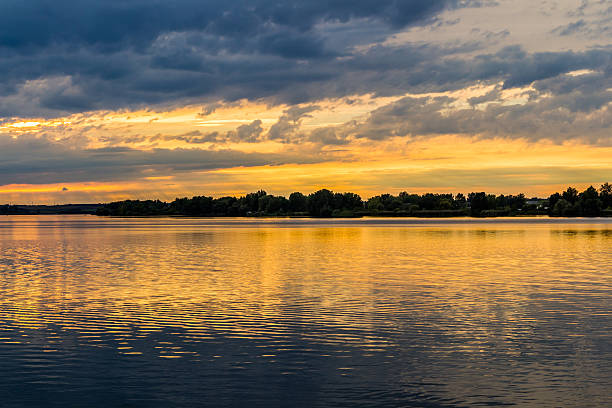 istock Sunset with dramatic sky over Nove Mlyny lake 493438638