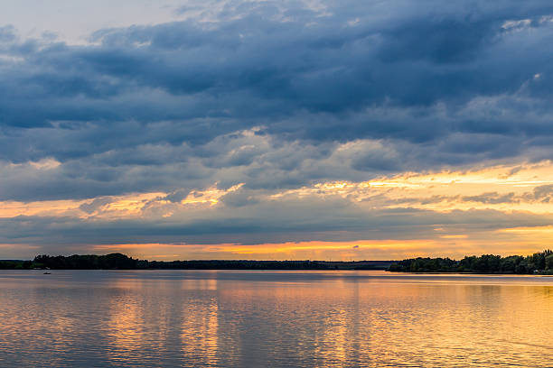 istock Sunset with dramatic sky over Nove Mlyny lake 493438670