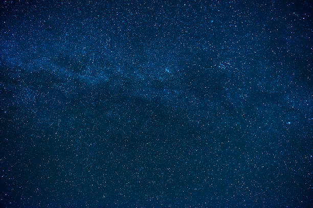 istock Blue dark night sky with many stars 493439474