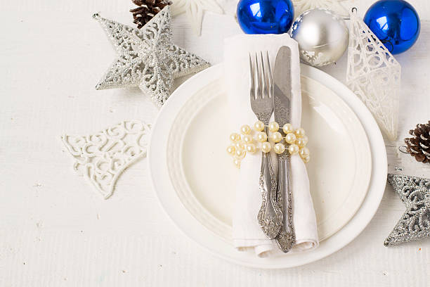 istock Christmas and New year table place setting with christmas decora 493442970