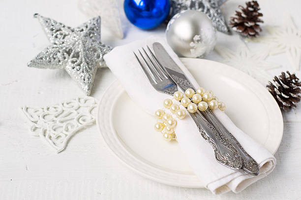 istock Christmas and New year table place setting with christmas decora 493442978