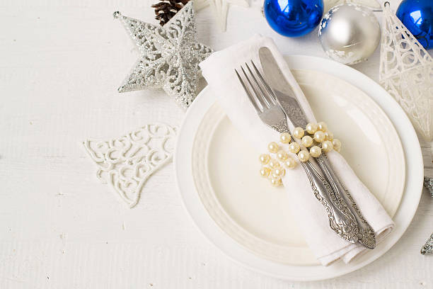 istock Christmas and New year table place setting with christmas decora 493443008