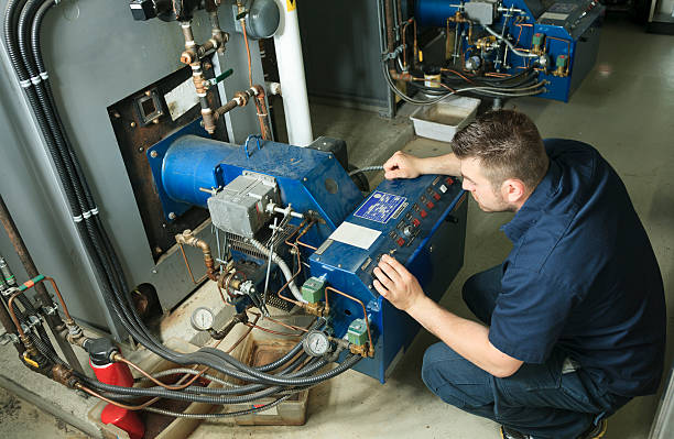 Electrician - Men Working Serviceman compressor stock pictures, royalty-free photos & images