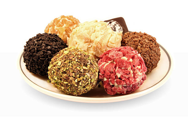 istock Dark, milk, white chocolate with caramel, nuts and berries 493444543