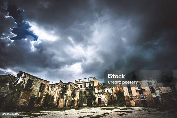 Storm Clouds Above Abandoned Town Stock Photo - Download Image Now - Ghost Town, Night, Alley