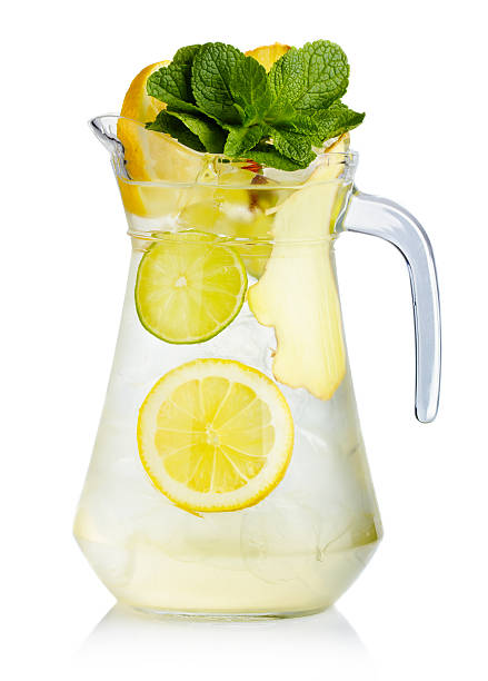 istock Full jug of fresh birch juice with lemon, ginger, mint 493447595