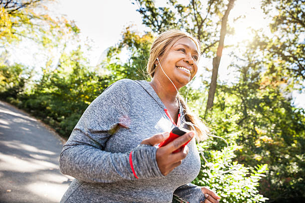 istock Woman running in Central Park New York 493448134