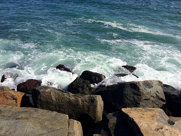 istock Atlantic ocean crashing into the rocks 493448192