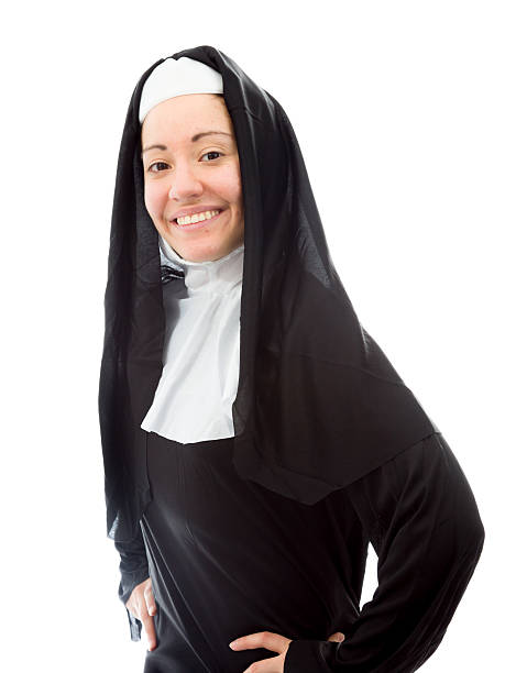istock Young nun smiling with her arms akimbo 493449957