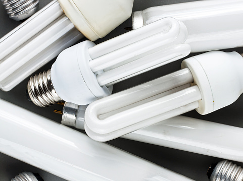Spent fluorescent lamps and energy saving bulbs awaiting disposal