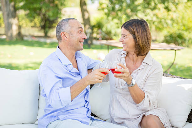 istock Mature Couple Having an Aperitif Outdoor 493450897