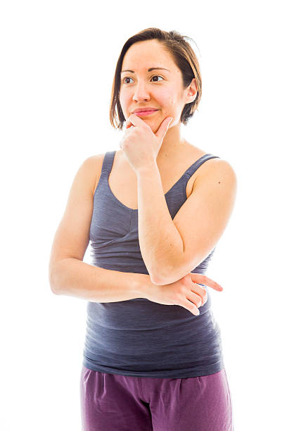istock Young woman thinking with hand on chin 493451065