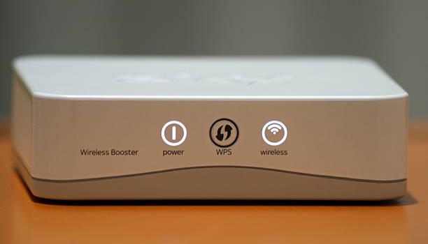 Wireless Booster that boosts WiFi broadband internet signal at home This picture shows you a small WiFi booster, that can be used to boost the signal strength of your wireless broadband internet connection signal at home. Its useful in particular to eliminate wireless blackspots in your home. broadband isp stock pictures, royalty-free photos & images