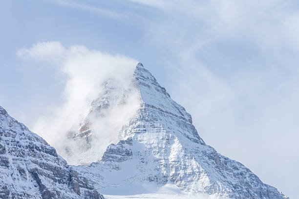 istock Pyramid Shaped Mount Assiniboine in the Fog 493474222