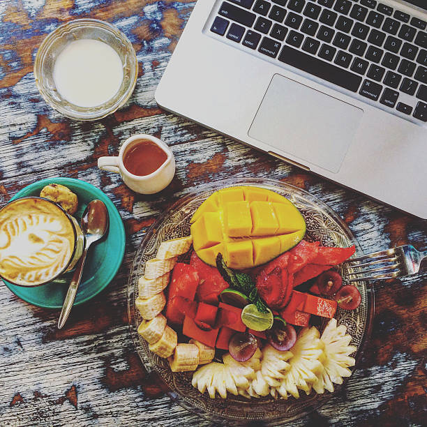 istock Laptop and healthy breakfast 493476282