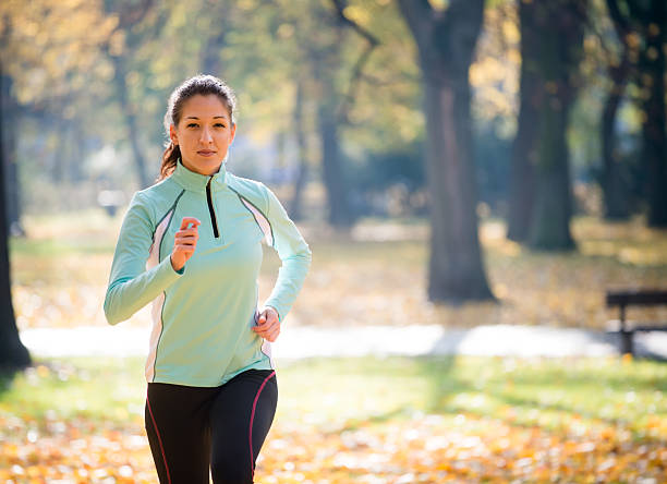 istock Woman jogging in nature 493478272