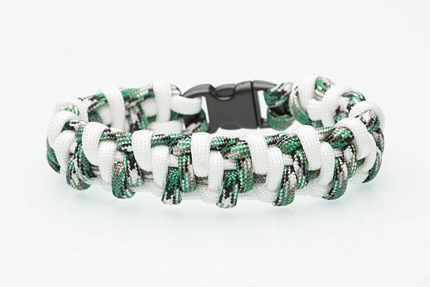 istock Black braided bracelet on white background 493481436