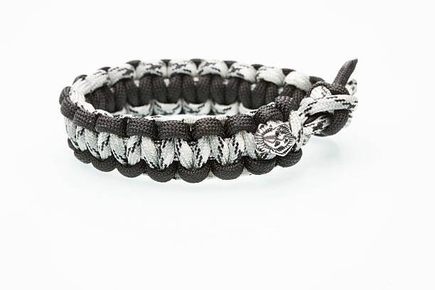 istock Black braided bracelet on white background 493481538