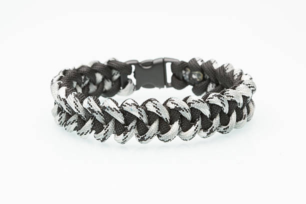 istock Black braided bracelet on white background 493481988