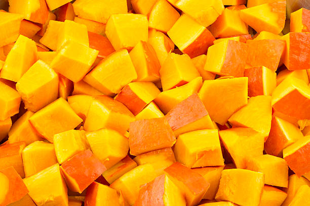 istock Pumpkin pieces as food background 493484174