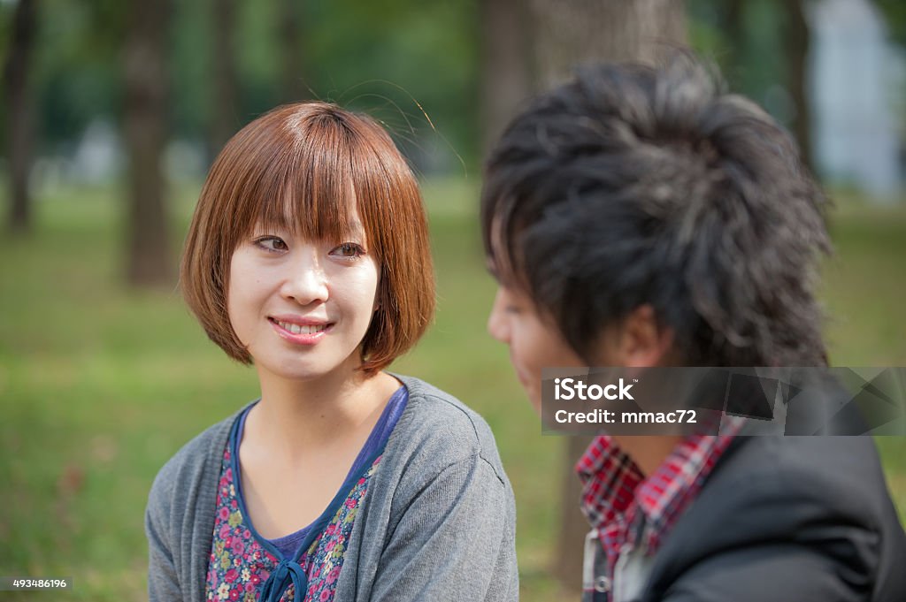Japaneese couple Portrait of Japanese  young man and woman. Taken at the Tokyo iStockalypse Japanese Ethnicity Stock Photo