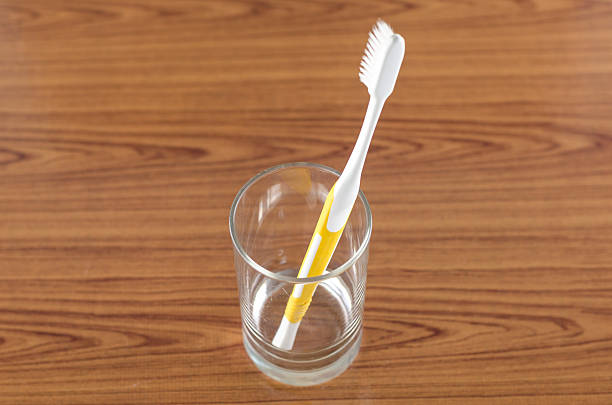 istock toothbrush in glass 493498495
