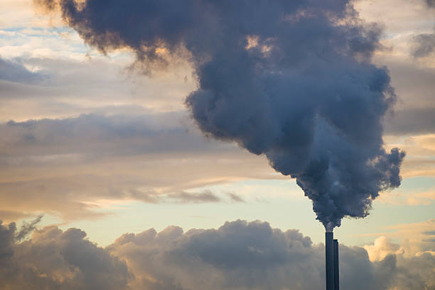 istock Smoke Coming Out Of Chimney 493499013