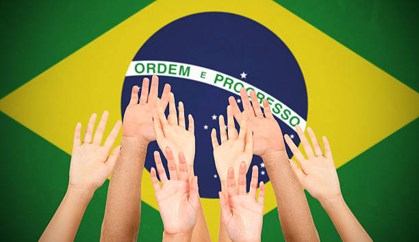 istock brazilian supporter wiht arm raised 493499055