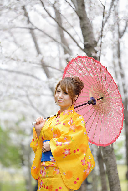 istock Woman Portrait & Sakura 493499603