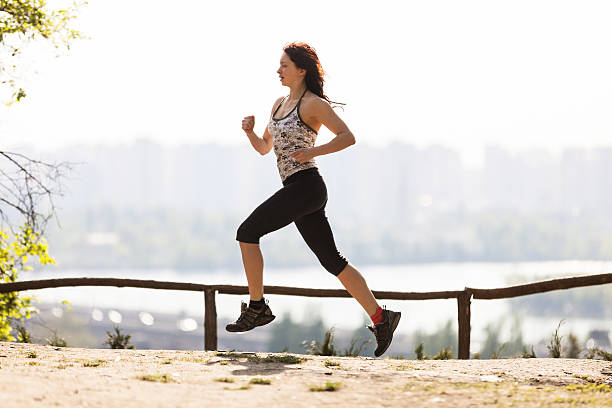 istock Young woman running in the morning 493500245