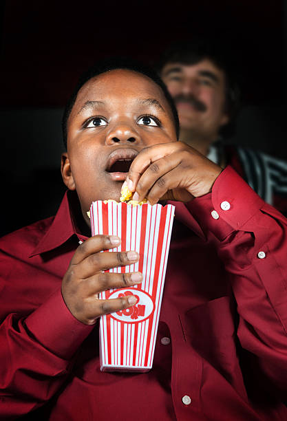 istock Kid at the movies 493503027