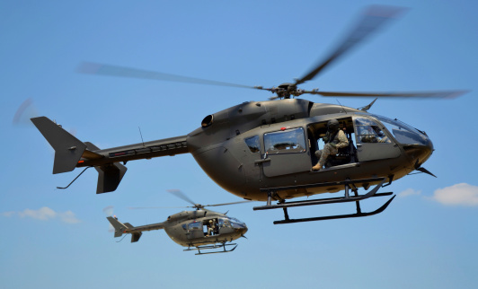 Helicopter Agusta-Westland AW139 PH-PXY of the Dutch Police Aviation Service fitted with camera's for surveillance. The Helicopter is flying in mid air and searching for shoplifters in Kampen, The Netherlands.