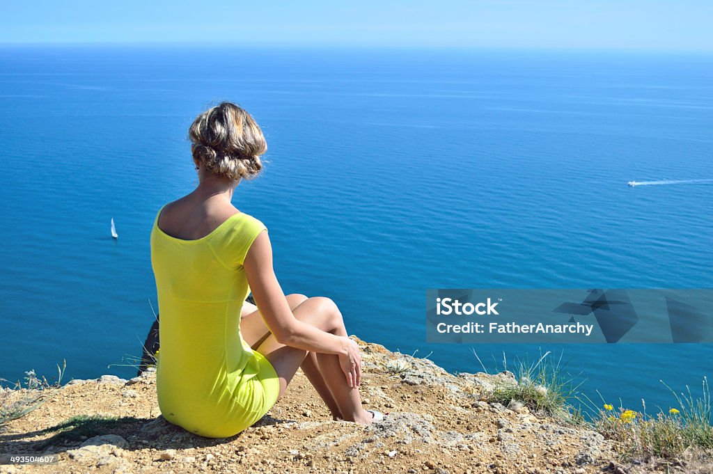 Girl on sea bay Adult Stock Photo