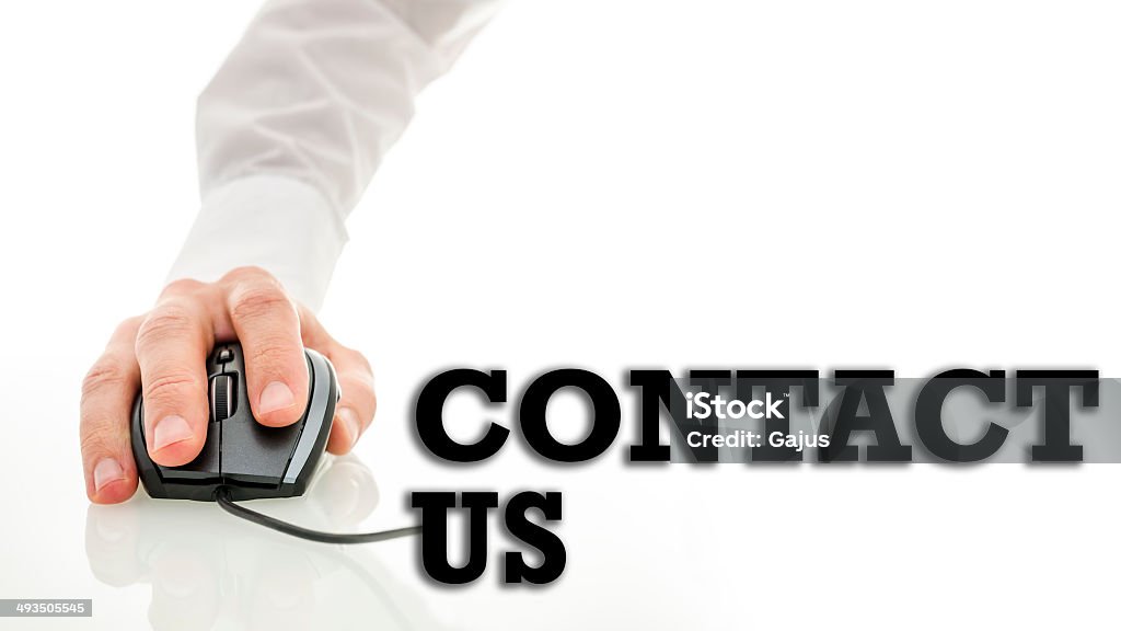 Contact us E-commerce, business support and communication concept of - Contact Us - with a man using a wired computer mouse connected to the text over white with copyspace Computer Mouse Stock Photo