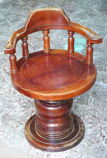 istock Wooden Chair on tiled floor 493505567