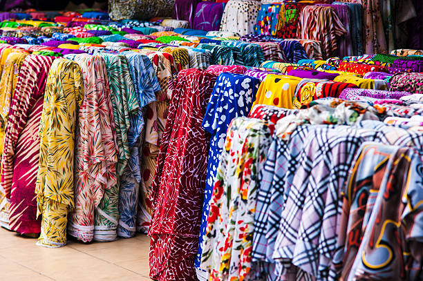 istock Rolls oh cloth selling at Cho Lon market, Saigon, Vietnam 493506098